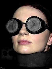 Claire Adams submits in a hard core live 3 girl BDSM event.